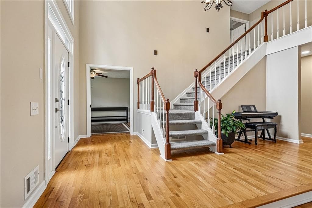 5 bedroom, 4 bathroom, 3,434 sq ft single family residence for sale at 5170 Forest Run Trace, Johns Creek, GA 30022 — photo 3