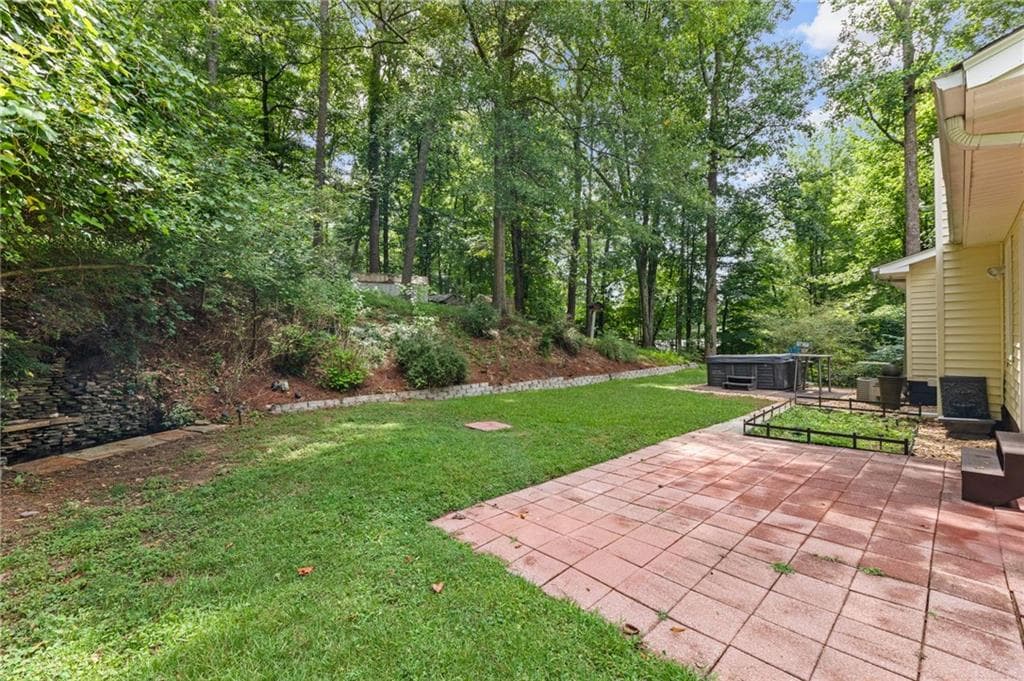 4 bedroom, 2 bathroom, 2,088 sq ft single family residence for sale at 702 Osco Parkway, Woodstock, GA 30188 — photo 2