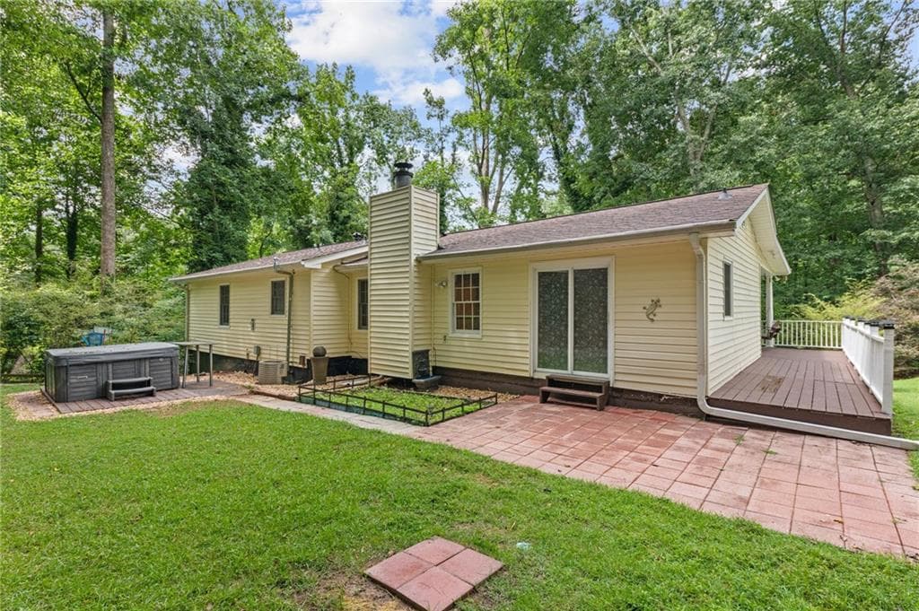 4 bedroom, 2 bathroom, 2,088 sq ft single family residence for sale at 702 Osco Parkway, Woodstock, GA 30188 — photo 4
