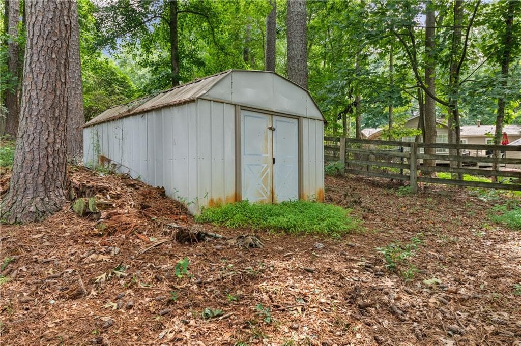 4 bedroom, 2 bathroom, 2,088 sq ft single family residence for sale at 702 Osco Parkway, Woodstock, GA 30188 — photo 5