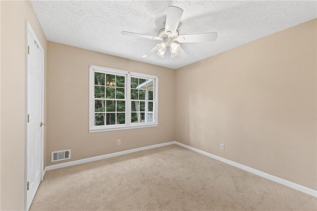 4 bedroom, 2 bathroom, 2,088 sq ft single family residence for sale at 702 Osco Parkway, Woodstock, GA 30188 — photo 6