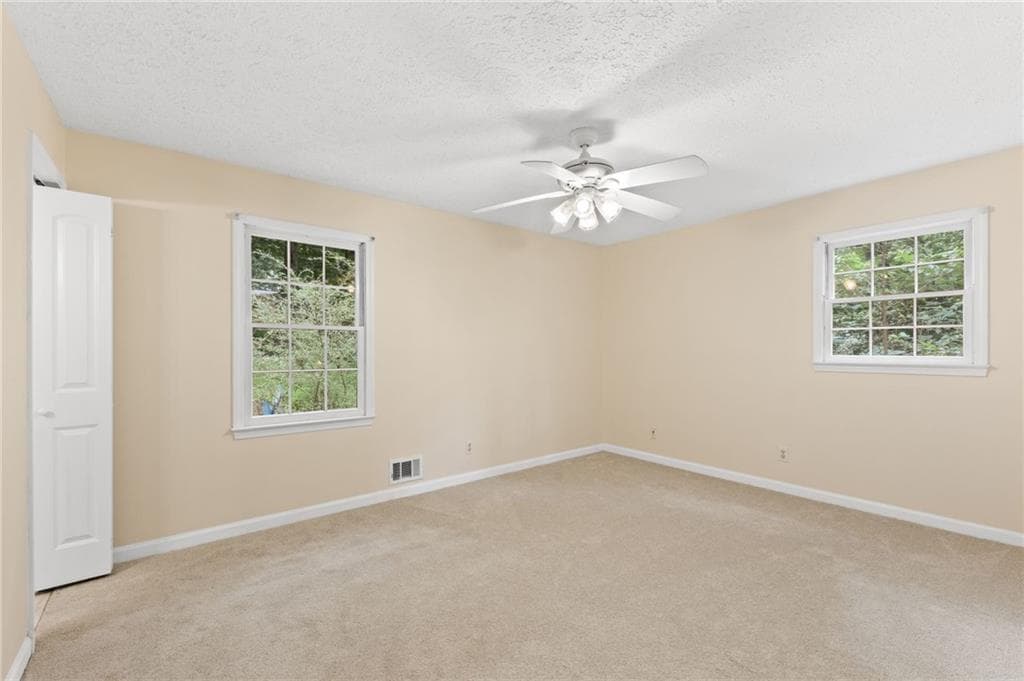 4 bedroom, 2 bathroom, 2,088 sq ft single family residence for sale at 702 Osco Parkway, Woodstock, GA 30188 — photo 10