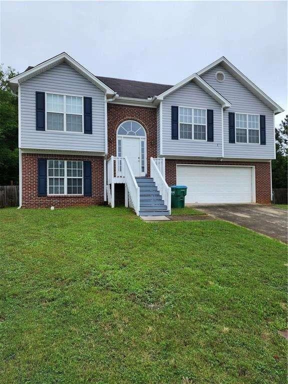 4 bedroom, 3 bathroom, 2,186 sq ft single family residence for rent at 1158 Olde Hinge Way, Snellville, GA 30078 for $2,275 a month — photo 1 of 29