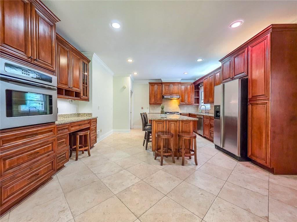5 bedroom, 5 bathroom, 5,988 sq ft single family residence for sale at 5599 Stone Creek Drive, Stone Mountain, GA 30087 — photo 10