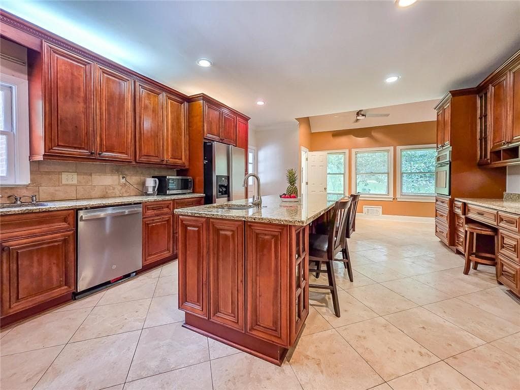 5 bedroom, 5 bathroom, 5,988 sq ft single family residence for sale at 5599 Stone Creek Drive, Stone Mountain, GA 30087 — photo 9