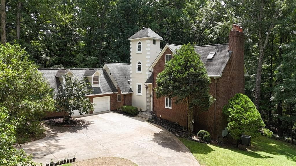 5 bedroom, 5 bathroom, 5,988 sq ft single family residence for sale at 5599 Stone Creek Drive, Stone Mountain, GA 30087