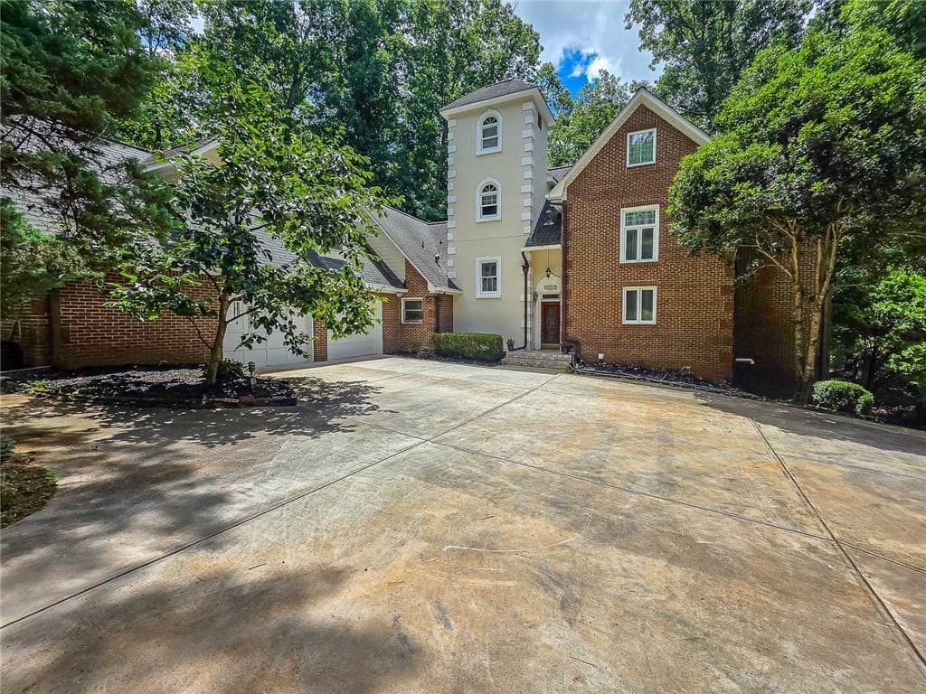 5 bedroom, 5 bathroom, 5,988 sq ft single family residence for sale at 5599 Stone Creek Drive, Stone Mountain, GA 30087 — photo 2