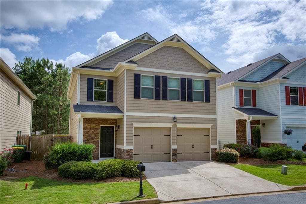 4 bedroom, 3 bathroom, 2,149 sq ft single family residence for rent at 302 Alcovy Way, Woodstock, GA 30188 for $2,450 a month — photo 1 of 17