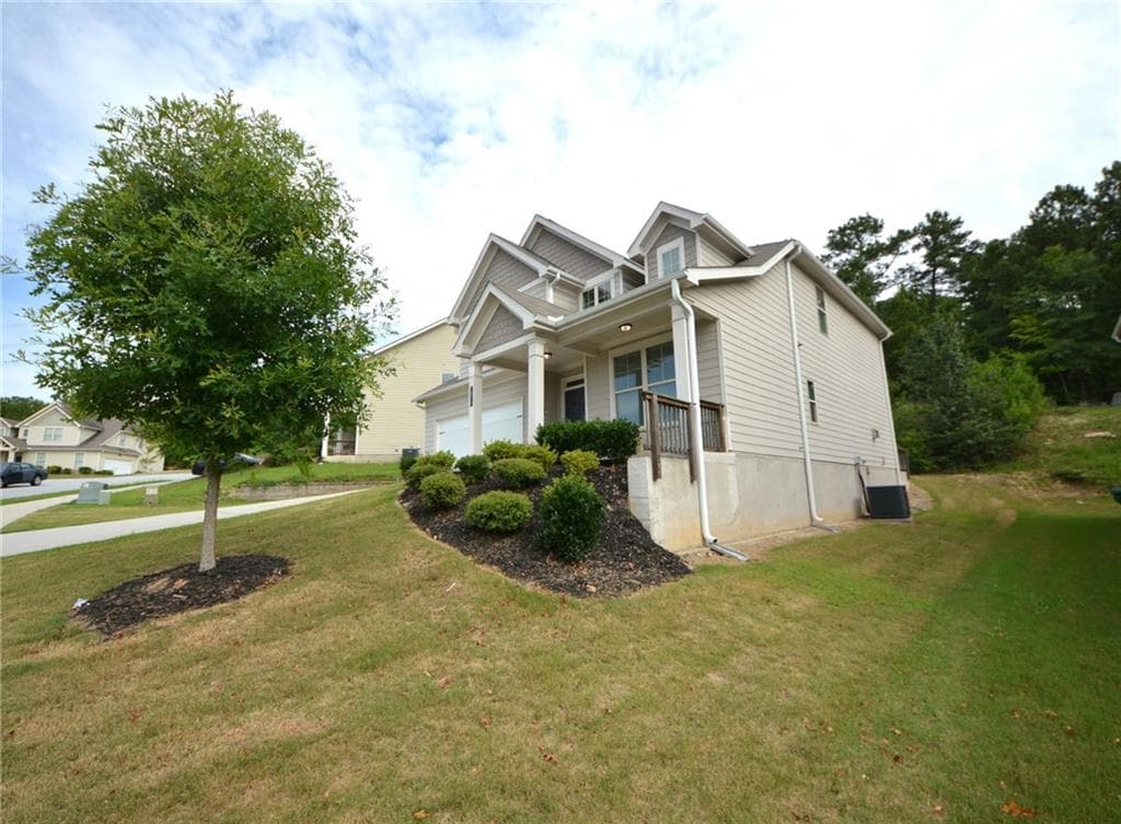 4 bedroom, 3 bathroom, 2,690 sq ft single family residence for sale at 2372 Haliard Way, Lithonia, GA 30058 — photo 3