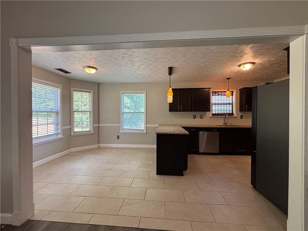 4 bedroom, 2 bathroom, 1,741 sq ft single family residence for sale at 3720 Scotland Lane, Snellville, GA 30039 — photo 6