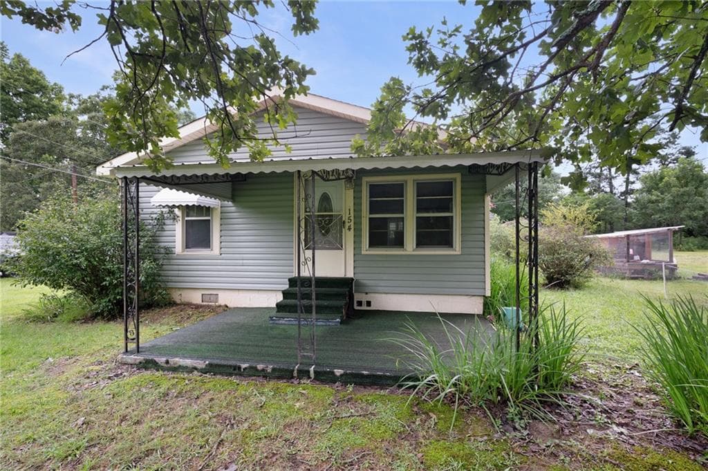 3 bedroom, 1 bathroom, 1,170 sq ft single family residence for sale at 154 County Line Road, Plainville, GA 30733 — photo 2