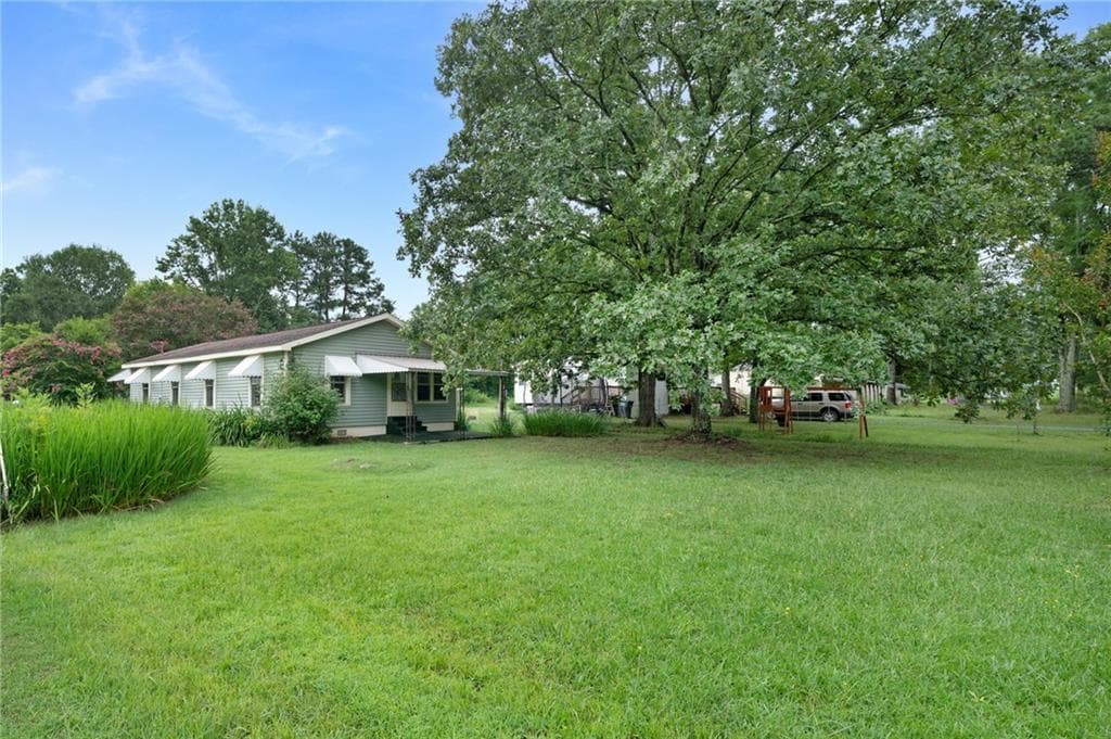 3 bedroom, 1 bathroom, 1,170 sq ft single family residence for sale at 154 County Line Road, Plainville, GA 30733 — photo 4