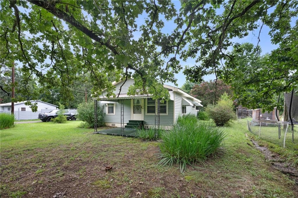 3 bedroom, 1 bathroom, 1,170 sq ft single family residence for sale at 154 County Line Road, Plainville, GA 30733 — photo 6