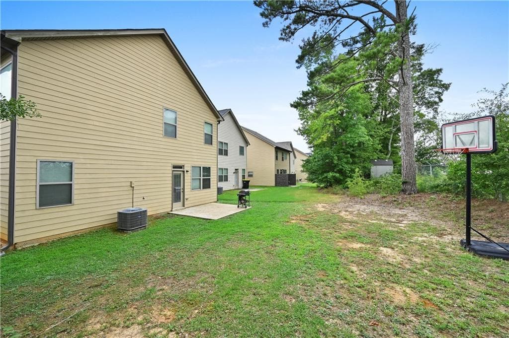 5 bedroom, 3 bathroom, 2,480 sq ft single family residence for sale at 11805 Lovejoy Crossing Boulevard, Hampton, GA 30228 — photo 8
