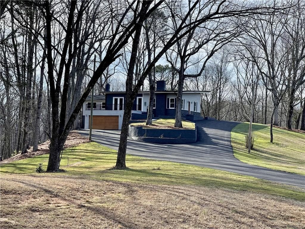4 bedroom, 3 bathroom, 3,828 sq ft single family residence for sale at 3425 Duckett Mill Road, Gainesville, GA 30506 — photo 3