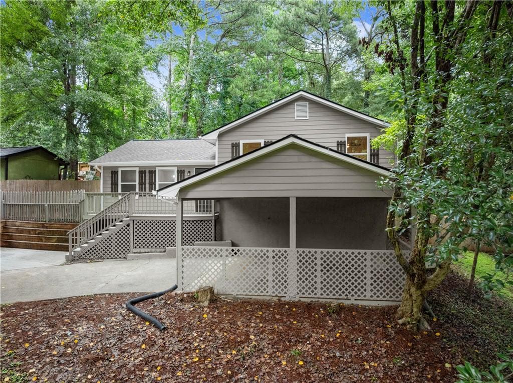 4 bedroom, 2 bathroom, 1,709 sq ft single family residence for sale at 3405 Romulus Drive, Duluth, GA 30097 — photo 2