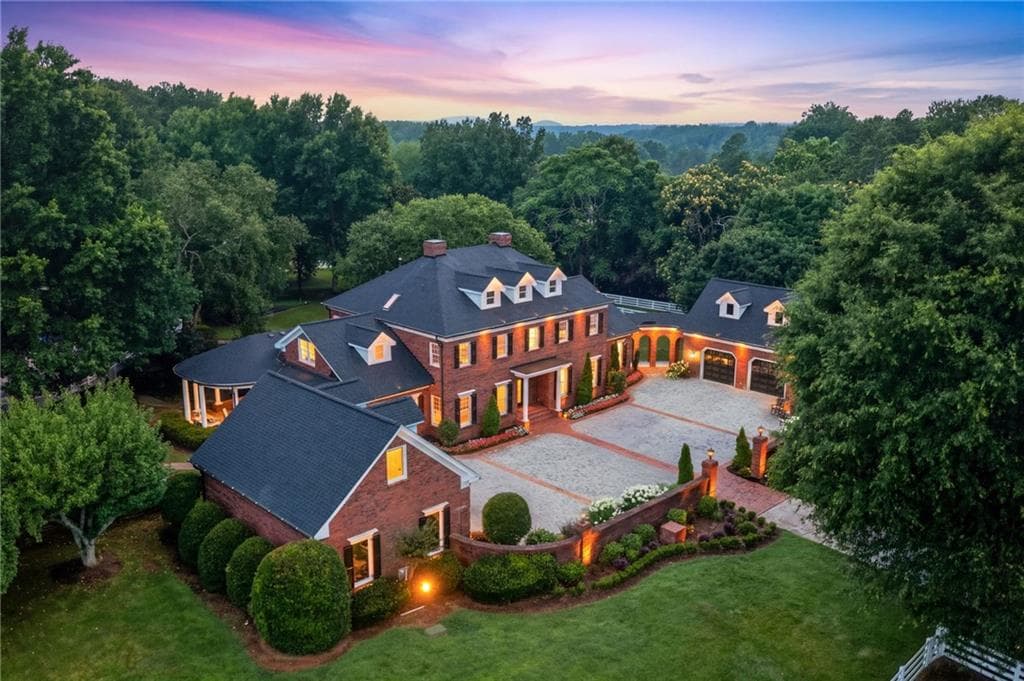 9 bedroom, 8 bathroom, 9,166 sq ft single family residence under contract at 555 Tullamore Way, Milton, GA 30004