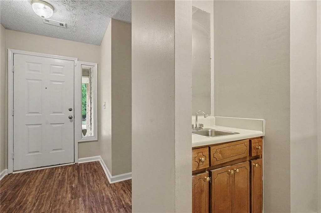 3 bedroom, 2 bathroom, 1,580 sq ft single family residence for sale at 2900 Rosecommons Drive, Hampton, GA 30228 — photo 4