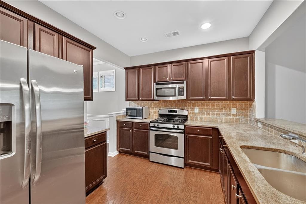 4 bedroom, 3 bathroom, 2,110 sq ft single family residence for sale at 369 Privet Circle, Suwanee, GA 30024 — photo 9