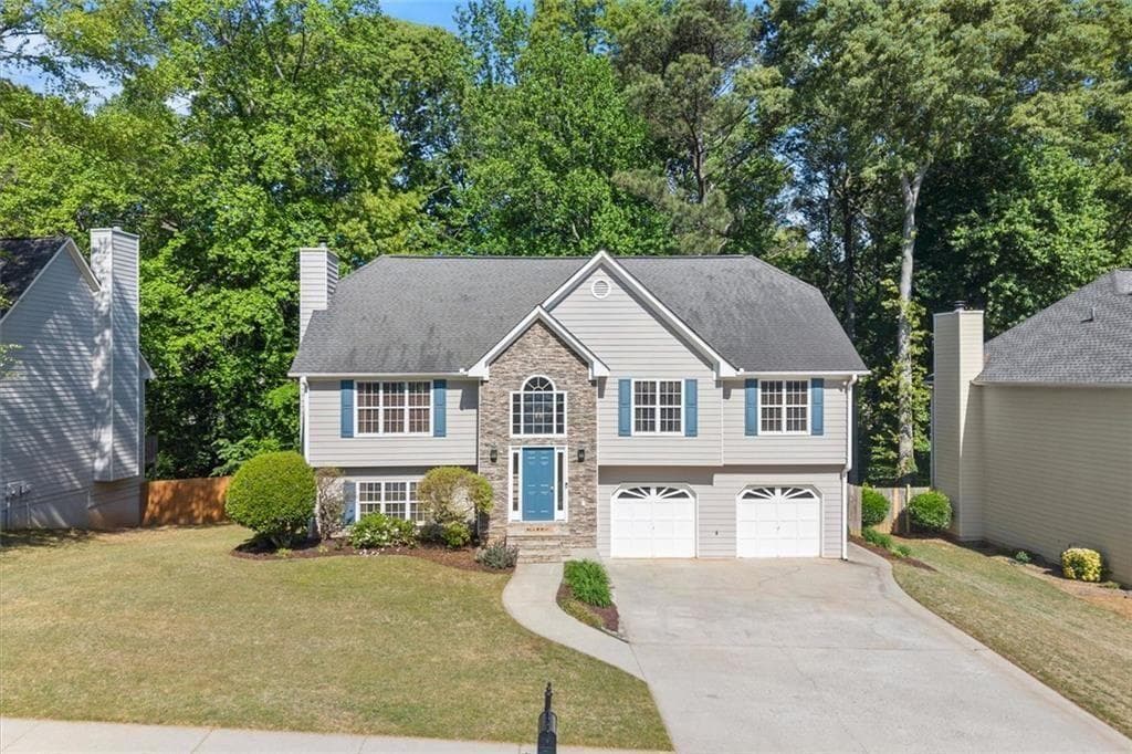 4 bedroom, 3 bathroom, 2,700 sq ft single family residence sold at 2056 Township Drive, Woodstock, GA 30189