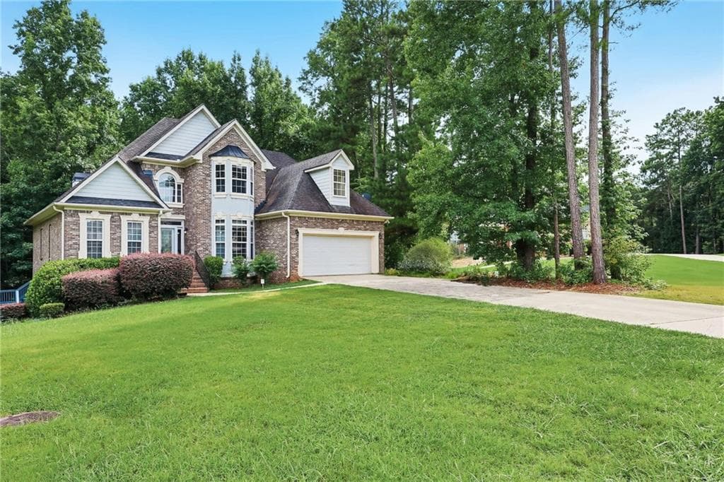 6 bedroom, 5 bathroom, 4,747 sq ft single family residence for sale at 136 Lumby Lane, Stockbridge, GA 30281 — photo 1 of 59