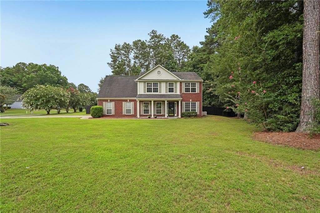 4 bedroom, 3 bathroom, 2,210 sq ft single family residence for sale at 5790 Woodstone Drive, Cumming, GA 30028 — photo 1 of 23