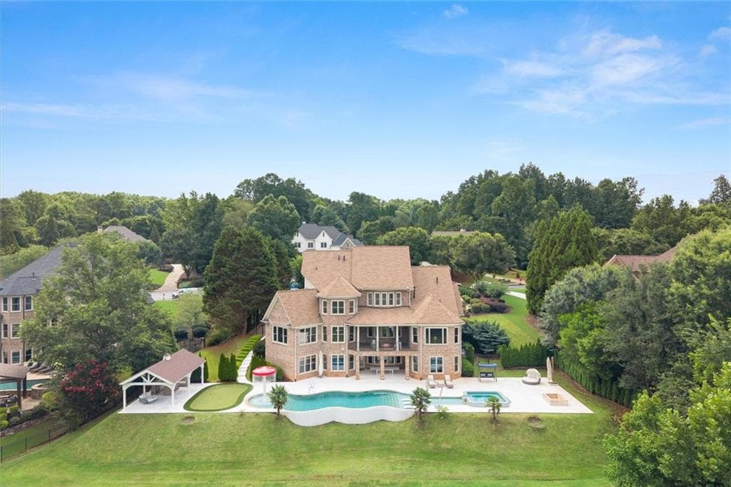6 bedroom, 8 bathroom, 7,729 sq ft home for sale at 15884 Meadow King Court, Milton, GA