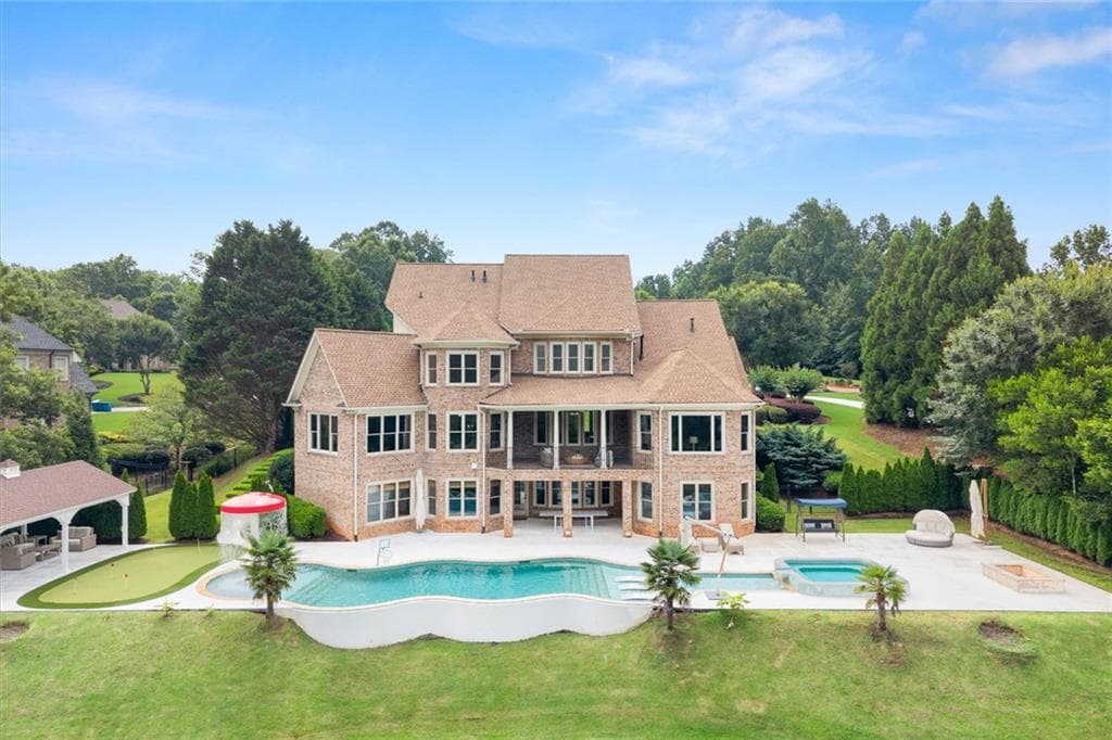 6 bedroom, 8 bathroom, 7,729 sq ft single family residence for sale at 15884 Meadow King Court, Milton, GA 30004 — photo 2