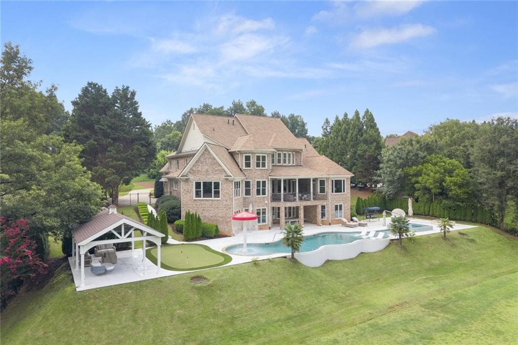 6 bedroom, 8 bathroom, 7,729 sq ft single family residence for sale at 15884 Meadow King Court, Milton, GA 30004 — photo 3