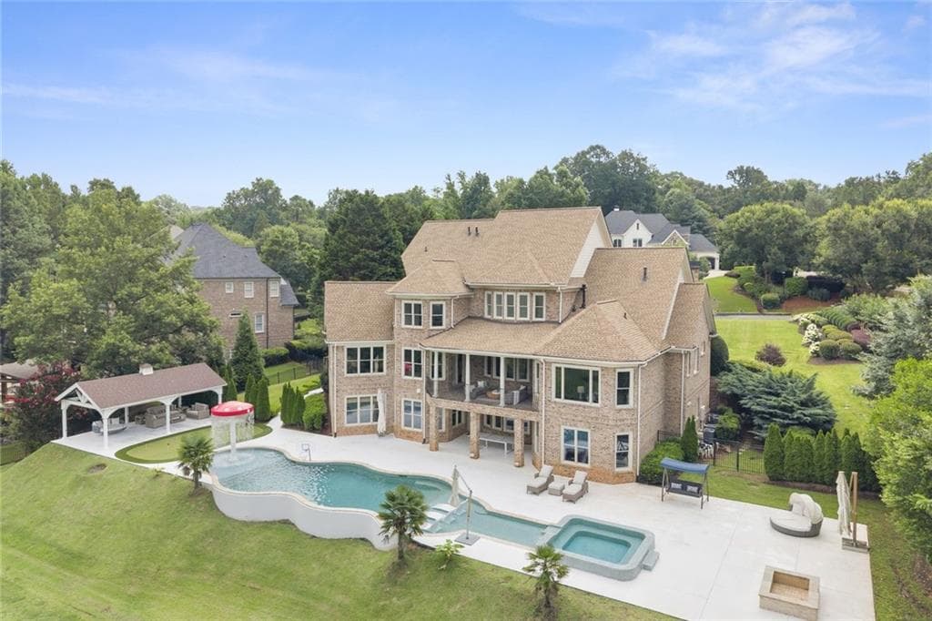 6 bedroom, 8 bathroom, 7,729 sq ft single family residence for sale at 15884 Meadow King Court, Milton, GA 30004 — photo 4