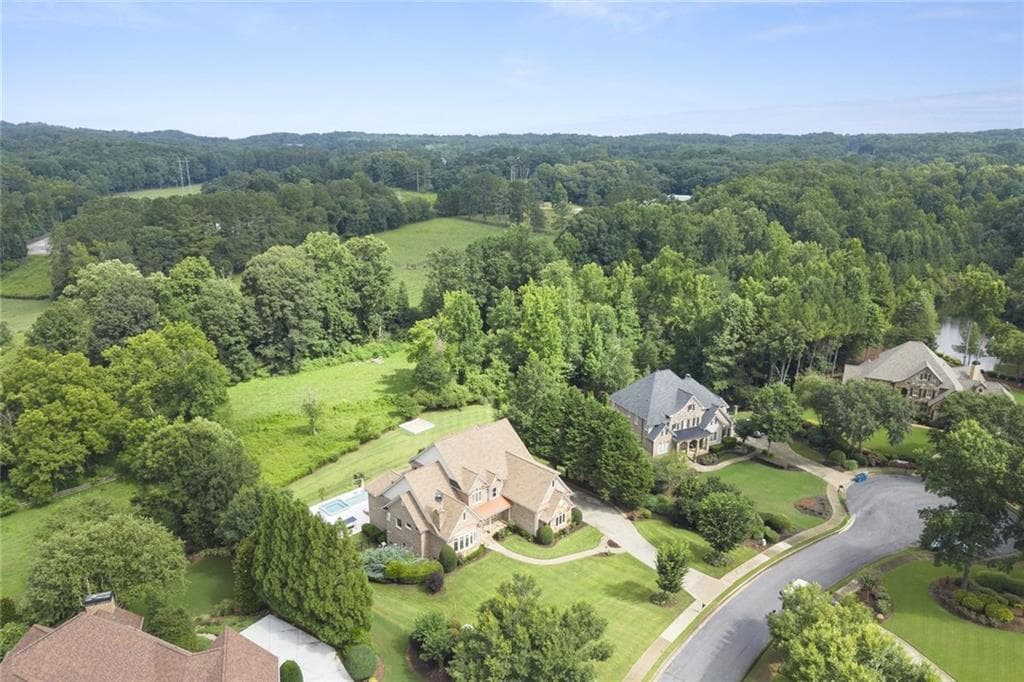 6 bedroom, 8 bathroom, 7,729 sq ft single family residence for sale at 15884 Meadow King Court, Milton, GA 30004 — photo 6