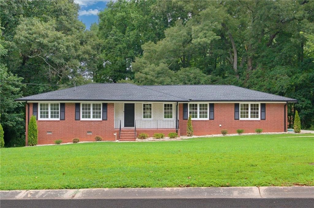 4 bedroom, 3 bathroom, 1,448 sq ft single family residence for sale at 1502 Kings Road, Marietta, GA 30062 — photo 2
