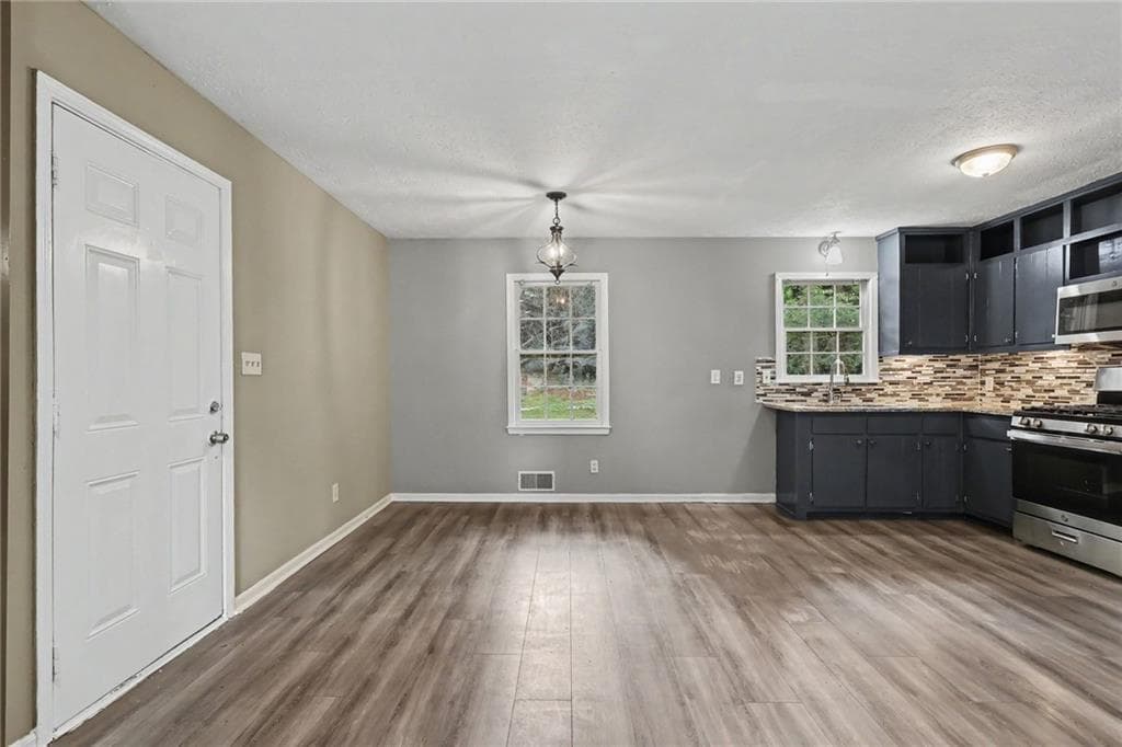 4 bedroom, 3 bathroom, 1,620 sq ft single family residence for sale at 3124 Stanford Circle, Lawrenceville, GA 30044 — photo 9
