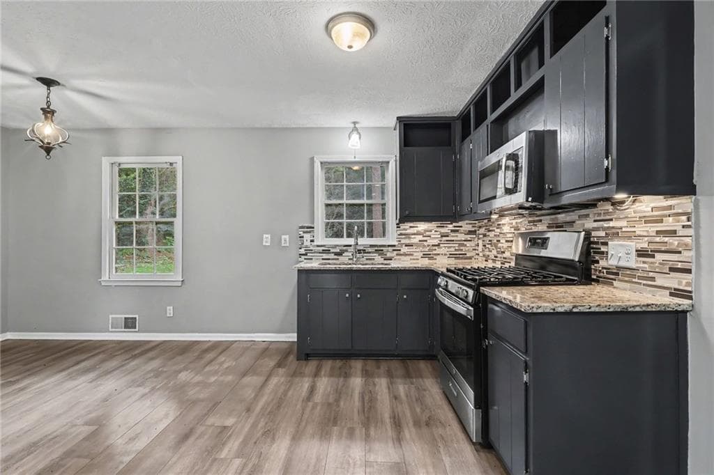 4 bedroom, 3 bathroom, 1,620 sq ft single family residence for sale at 3124 Stanford Circle, Lawrenceville, GA 30044 — photo 10