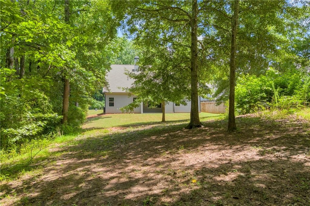 4 bedroom, 3 bathroom, 2,653 sq ft single family residence for sale at 120 Morris Creek Drive, Hoschton, GA 30548 — photo 3