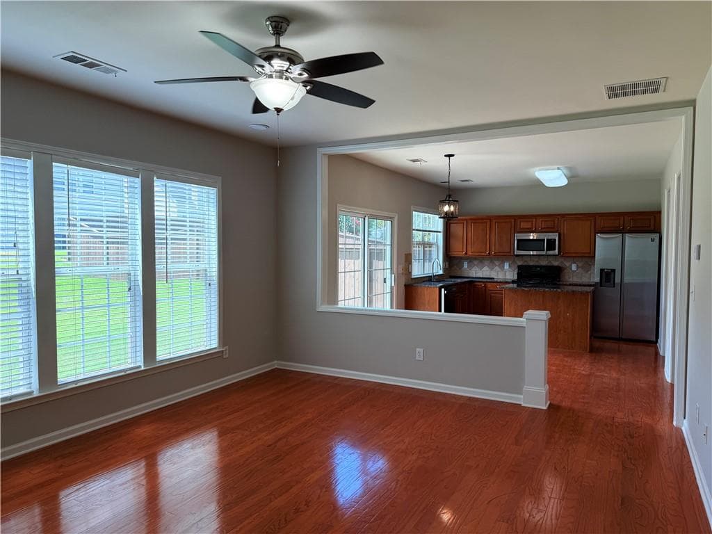 4 bedroom, 3 bathroom, 2,052 sq ft single family residence for rent at 8930 Ruel Lane, Suwanee, GA 30024 for $2,695 a month — photo 2