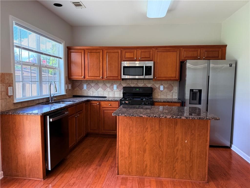 4 bedroom, 3 bathroom, 2,052 sq ft single family residence for rent at 8930 Ruel Lane, Suwanee, GA 30024 for $2,695 a month — photo 3