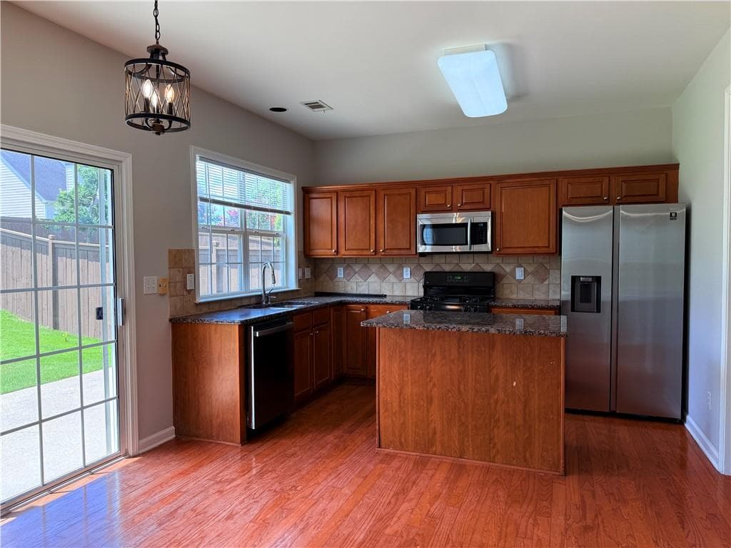 4 bedroom, 3 bathroom, 2,052 sq ft single family residence for rent at 8930 Ruel Lane, Suwanee, GA 30024 for $2,695 a month — photo 4