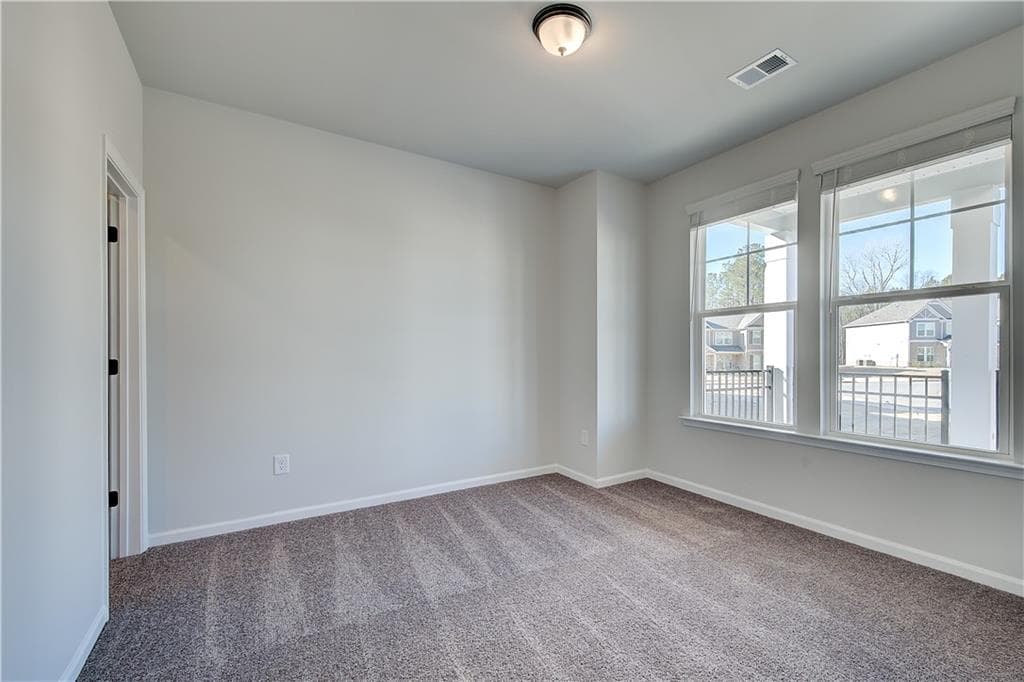4 bedroom, 3 bathroom, 2,517 sq ft single family residence for sale at 901 Kranston Drive, Locust Grove, GA 30248 — photo 5