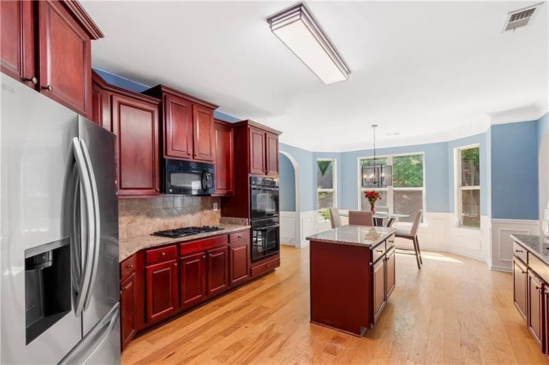 4 bedroom, 3 bathroom, 3,193 sq ft single family residence for sale at 4815 Roosevelt Circle, Cumming, GA 30040 — photo 6