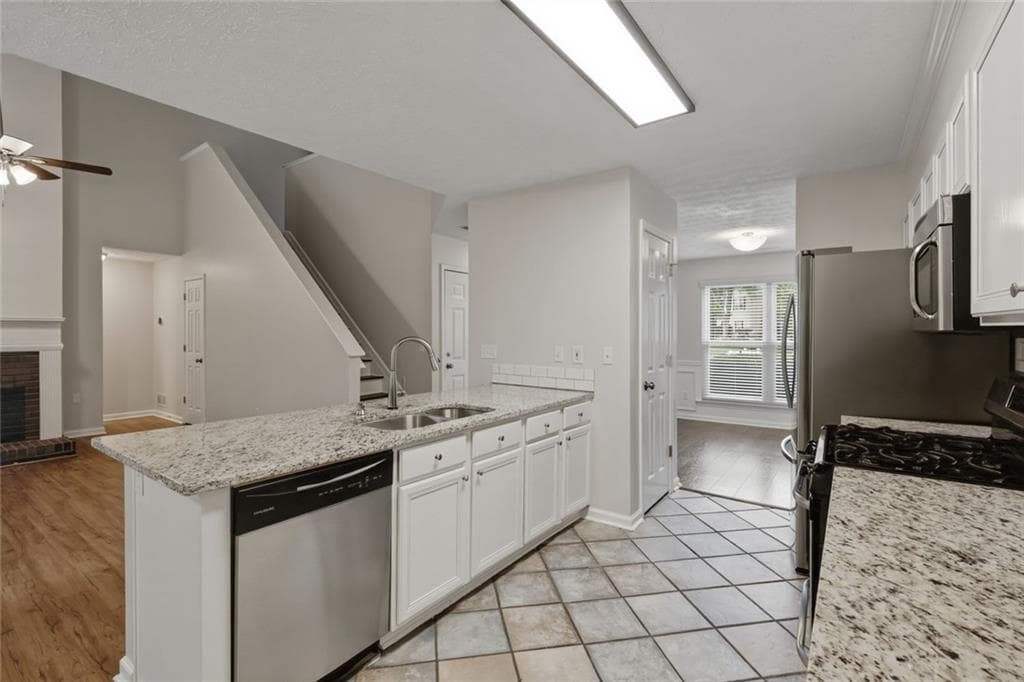 3 bedroom, 3 bathroom, 1,740 sq ft single family residence for sale at 3130 Windsor Gate Run Run, Duluth, GA 30096 — photo 5