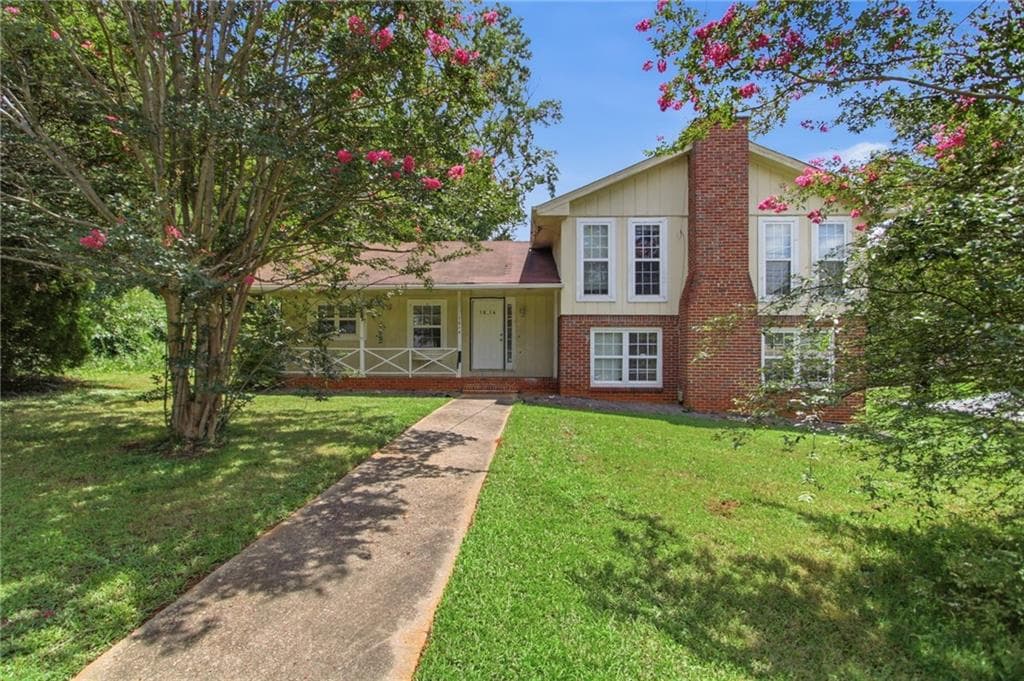 4 bedroom, 3 bathroom, 2,047 sq ft single family residence for sale at 1614 Devon Court, Stone Mountain, GA 30088 — photo 1 of 41
