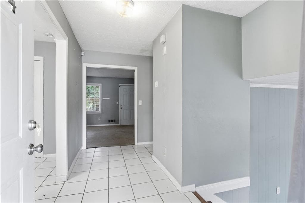 4 bedroom, 3 bathroom, 2,047 sq ft single family residence for sale at 1614 Devon Court, Stone Mountain, GA 30088 — photo 10
