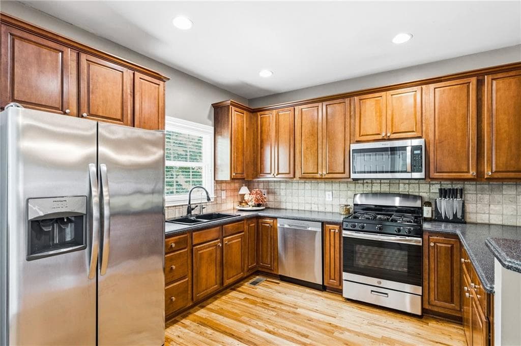 3 bedroom, 4 bathroom, 2,301 sq ft townhouse for sale at 1200 Wing Street 12, Atlanta, GA 30350 — photo 7