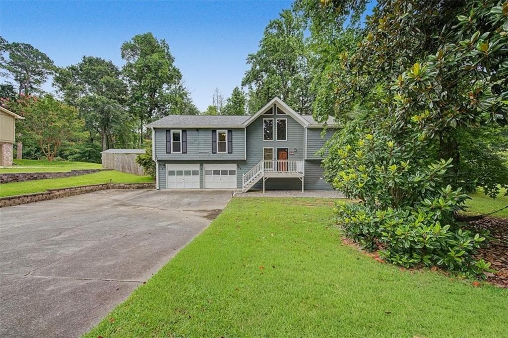 4 bedroom, 3 bathroom, 2,619 sq ft single family residence for sale at 1046 Washington Avenue, Woodstock, GA 30188 — photo 3