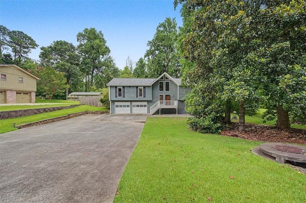 4 bedroom, 3 bathroom, 2,619 sq ft single family residence for sale at 1046 Washington Avenue, Woodstock, GA 30188 — photo 5