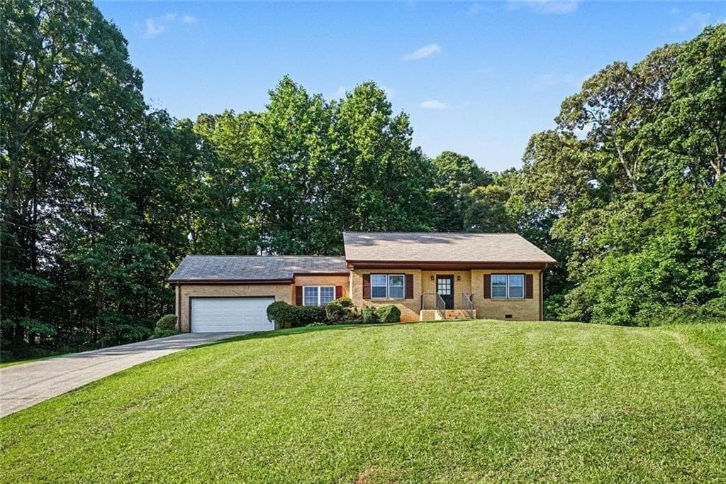 3 bedroom, 2 bathroom, 1,951 sq ft single family residence for sale at 7317 Deerwood Drive, Riverdale, GA 30296 — photo 2