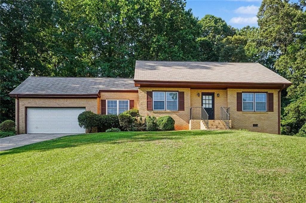 3 bedroom, 2 bathroom, 1,951 sq ft single family residence for sale at 7317 Deerwood Drive, Riverdale, GA 30296 — photo 3