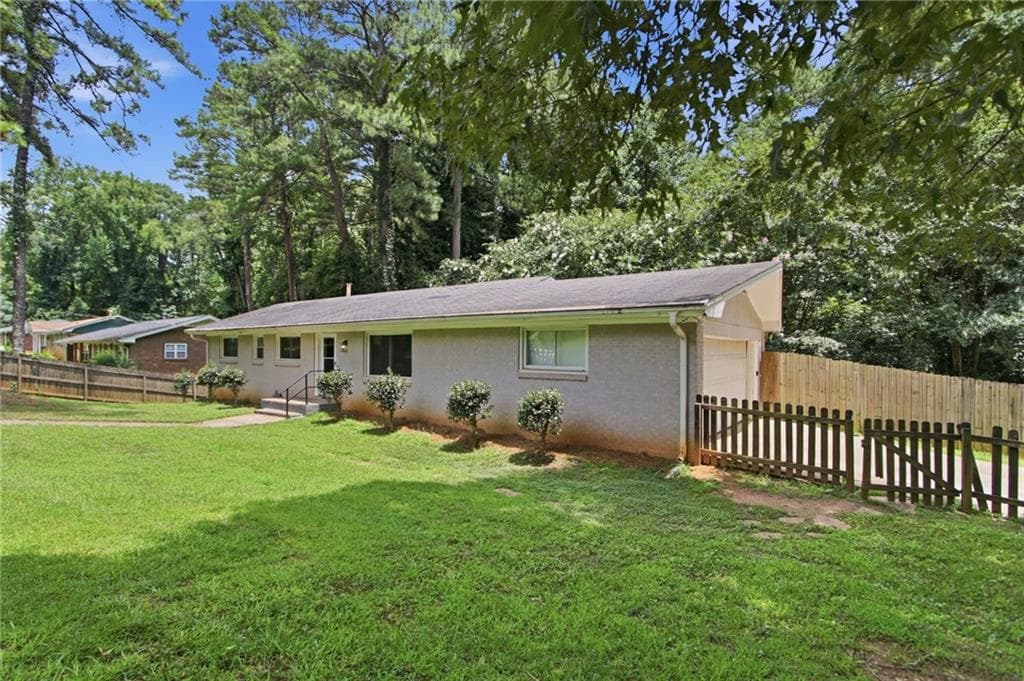4 bedroom, 3 bathroom, 1,813 sq ft single family residence for sale at 1760 Danrich Drive, Decatur, GA 30032 — photo 2