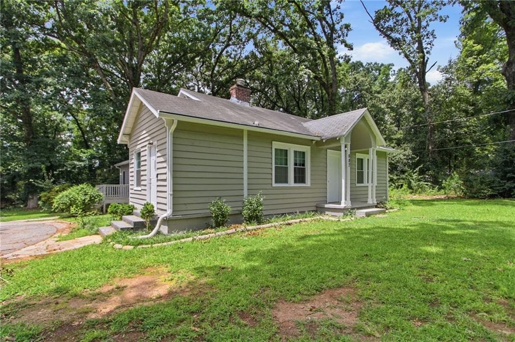 3 bedroom, 2 bathroom, 1,778 sq ft single family residence for sale at 887 Ellis Road, Stone Mountain, GA 30083 — photo 3